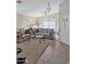 Inviting living room with neutral tones, a ceiling fan, and plenty of natural light at 528 E Wolf Hollow Dr, Casa Grande, AZ 85122