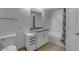 Bright bathroom featuring a granite countertop, white cabinets, and a shower-tub combo at 5401 E Van Buren St # 1103, Phoenix, AZ 85008