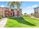 Apartment complex boasts manicured lawns and mature trees at 5401 E Van Buren St # 1103, Phoenix, AZ 85008