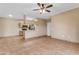 Living room showing the kitchen area with breakfast bar and appliances at 5401 E Van Buren St # 1103, Phoenix, AZ 85008