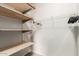 Spacious walk-in closet with ample shelving and hanging space for organized storage at 5401 E Van Buren St # 2053, Phoenix, AZ 85008