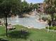 Attractive water feature with fountains, rocks, and lush landscaping in a well-maintained outdoor space at 5401 E Van Buren St # 2053, Phoenix, AZ 85008