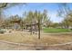 Community playground with various play structures and green spaces for outdoor recreation at 5411 E Duane Ln, Cave Creek, AZ 85331