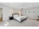 Bright bedroom featuring neutral colors, recessed lighting, and comfortable furnishings and an accent wall art at 5529 N 19Th St, Phoenix, AZ 85016