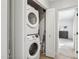 Convenient laundry area with stacked washer and dryer, providing efficient use of space with easy access at 5529 N 19Th St, Phoenix, AZ 85016