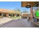 Outdoor space with Dynamite Beer Company, green trees, and well-maintained brick pathway at 5529 N 19Th St, Phoenix, AZ 85016