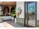 The Henry restaurant entrance with tiled walls, plants, and signage promoting its opening date at 5529 N 19Th St, Phoenix, AZ 85016