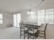 Dining room has natural light with a table and chairs and view to the slider at 5735 E Mcdowell Rd # 197, Mesa, AZ 85215