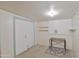 Spacious storage area with shelving and a workbench at 5735 E Mcdowell Rd # 197, Mesa, AZ 85215