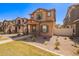 Inviting two-story home with desert landscaping and a well-kept lawn at 5828 E Hoover Ave, Mesa, AZ 85206