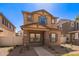 Beautiful two-story home with desert landscaping, offering inviting curb appeal at 5828 E Hoover Ave, Mesa, AZ 85206