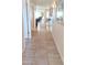 Inviting hallway with tile floors, leading to a bright living area with neutral walls at 8020 E Keats Ave # 271, Mesa, AZ 85209