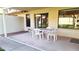 Inviting outdoor patio furnished with a table and chairs, ideal for relaxation at 8020 E Keats Ave # 271, Mesa, AZ 85209