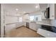 Modern kitchen featuring stainless steel appliances, quartz countertop, and lots of storage at 8442 E Chaparral Rd, Scottsdale, AZ 85250