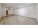 Bright and airy living room with tile flooring, recessed lighting, and ample natural light at 8442 E Chaparral Rd, Scottsdale, AZ 85250