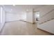 Expansive living room featuring tile floors, recessed lighting, and ample space for flexible design options at 8442 E Chaparral Rd, Scottsdale, AZ 85250