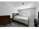 Simple bedroom with wood-look floors and a window offering lots of natural light at 8600 E Broadway Rd # 150, Mesa, AZ 85208