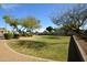 Lush community green space with mature trees, inviting walking paths, and well-maintained landscaping at 888 E Sheffield Ave, Chandler, AZ 85225