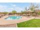 Sparkling community pool offers a refreshing escape with plenty of seating and shade at 900 W Broadway Ave # 66, Apache Junction, AZ 85120