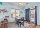 Dining area with a view to the patio via sliding glass doors at 900 W Broadway Ave # 66, Apache Junction, AZ 85120