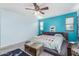 Large main bedroom featuring a ceiling fan, gray walls, and turquoise accent wall at 900 W Broadway Ave # 66, Apache Junction, AZ 85120