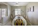 Bright dining room featuring a window with shutters and classic decor at 9149 E Auburn St, Mesa, AZ 85207