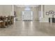 Grand foyer with white double doors, decorative columns and tile flooring at 9161 W Bajada Rd, Peoria, AZ 85383