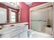 Bathroom featuring a vanity, framed mirror, a toilet and shower-tub combination at 9614 W Pleasant Valley Rd, Sun City, AZ 85351