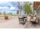Inviting backyard patio with comfortable seating and a built-in grill, perfect for outdoor gatherings at 11612 S 51St St, Phoenix, AZ 85044