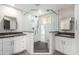 Modern bathroom with a large walk-in shower and double vanity sinks at 11612 S 51St St, Phoenix, AZ 85044