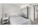 Bright bedroom showcasing stylish decor, ample closet space, and a calming aesthetic at 11612 S 51St St, Phoenix, AZ 85044