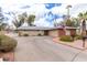 Spacious single-story home with a long driveway and well-maintained desert landscaping at 11612 S 51St St, Phoenix, AZ 85044