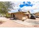 Exterior view showcasing the backyard, patio area, RV storage and outdoor living space at 11612 S 51St St, Phoenix, AZ 85044