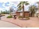 Single-story home with desert landscaping and a tall palm tree at 11612 S 51St St, Phoenix, AZ 85044