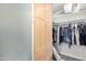 Well-organized walk-in closet featuring ample storage with shelves and drawers at 11612 S 51St St, Phoenix, AZ 85044