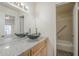 Bathroom showcasing vessel sink, granite countertop, and shower-tub combo at 11666 N 28Th Dr # 196, Phoenix, AZ 85029