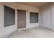 Covered patio entry features security door, screen windows, and small storage closet at 11666 N 28Th Dr # 196, Phoenix, AZ 85029
