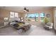 Bright and airy main bedroom offering great views of the desert landscape and golf course at 15751 W Linksview Dr, Surprise, AZ 85374