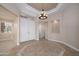 Entryway with tile flooring, decorative lighting, and double doors at 15751 W Linksview Dr, Surprise, AZ 85374