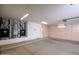 Well-maintained garage with storage cabinets, water heater, and utility connections adds functionality and convenience at 15751 W Linksview Dr, Surprise, AZ 85374