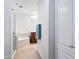 Bathroom with a walk-in glass shower, soaking tub, and a wood vanity with and sinks at 16 W Encanto Blvd # 616, Phoenix, AZ 85003
