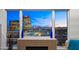 City view from inside the home showing the skyline with distant mountains at dusk at 16 W Encanto Blvd # 616, Phoenix, AZ 85003