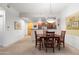 Inviting dining area with a wooden table set, open to the kitchen for easy entertaining and Gathering meals at 16 W Encanto Blvd # 616, Phoenix, AZ 85003