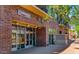 Community business entrance with brick facade and glass doors at 16 W Encanto Blvd # 616, Phoenix, AZ 85003