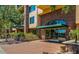 Inviting entrance with brick accents and lush landscaping at 16 W Encanto Blvd # 616, Phoenix, AZ 85003