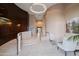 Spacious lobby featuring tiled floor, comfortable seating, and elegant chandelier lighting at 16 W Encanto Blvd # 616, Phoenix, AZ 85003