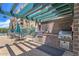 Outdoor kitchen equipped with built-in grill, counter space, and dining area at 16 W Encanto Blvd # 616, Phoenix, AZ 85003