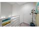 Stairwell with neutral paint, modern railing, and artistic decorations at 16 W Encanto Blvd # 616, Phoenix, AZ 85003