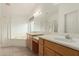 Bright bathroom featuring double vanity, large mirror, soaking tub, and separate shower at 16028 N Nyack Dr, Fountain Hills, AZ 85268