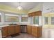 The kitchen boasts stainless steel appliances, neutral countertops, and ample cabinet space at 16028 N Nyack Dr, Fountain Hills, AZ 85268